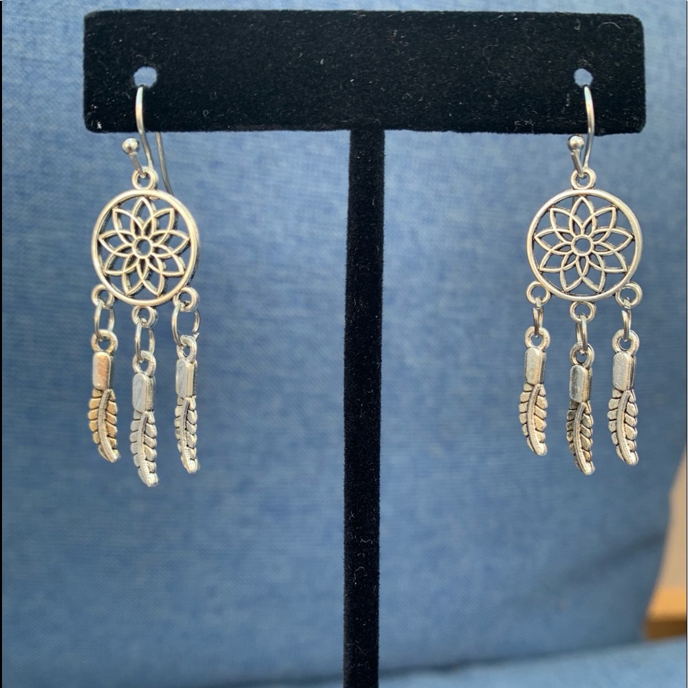 Silver colored dream catcher earrings